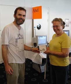 Chris Hughes presenting the 3000th copy of Abel